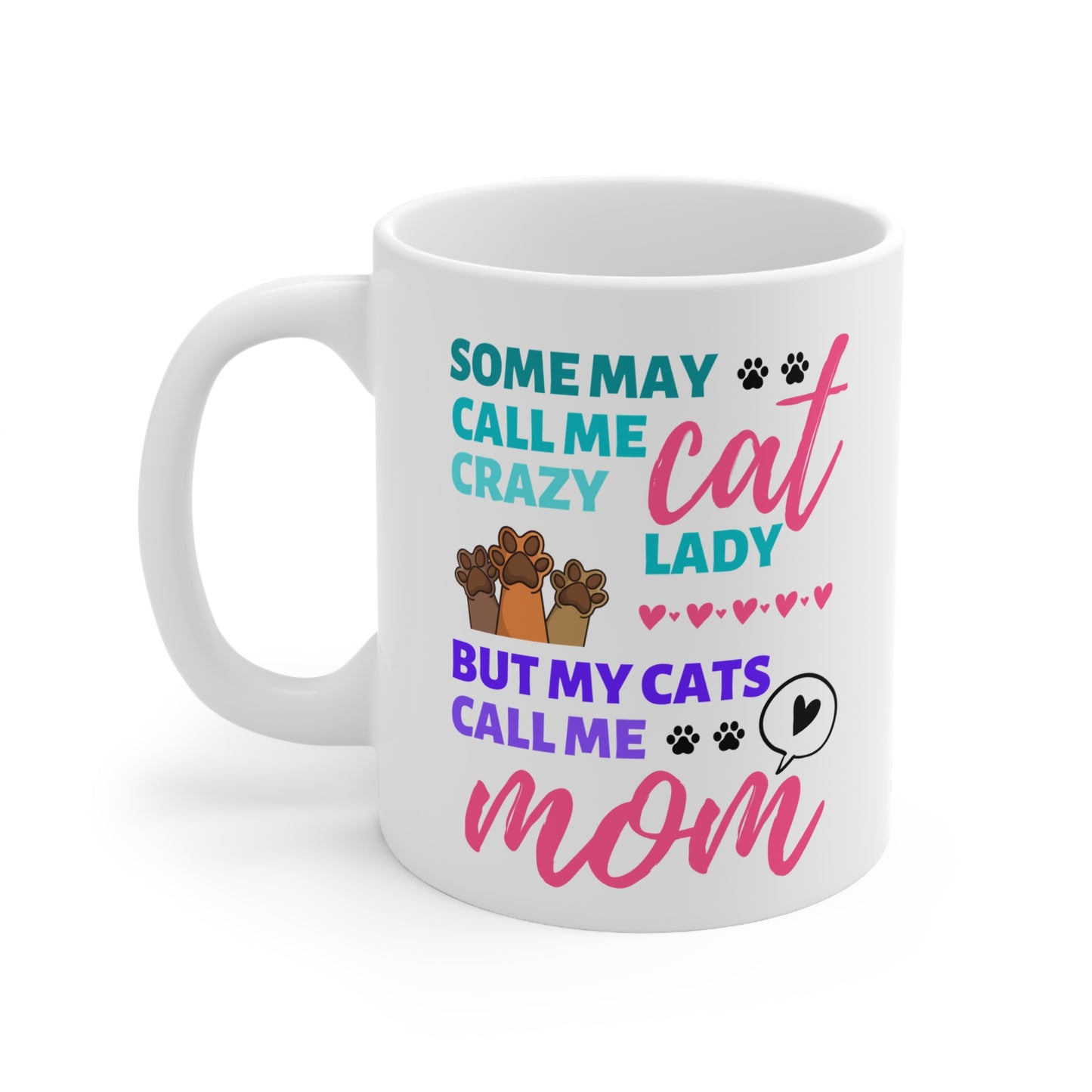 White mug with colorful text and cat illustrations on a white background