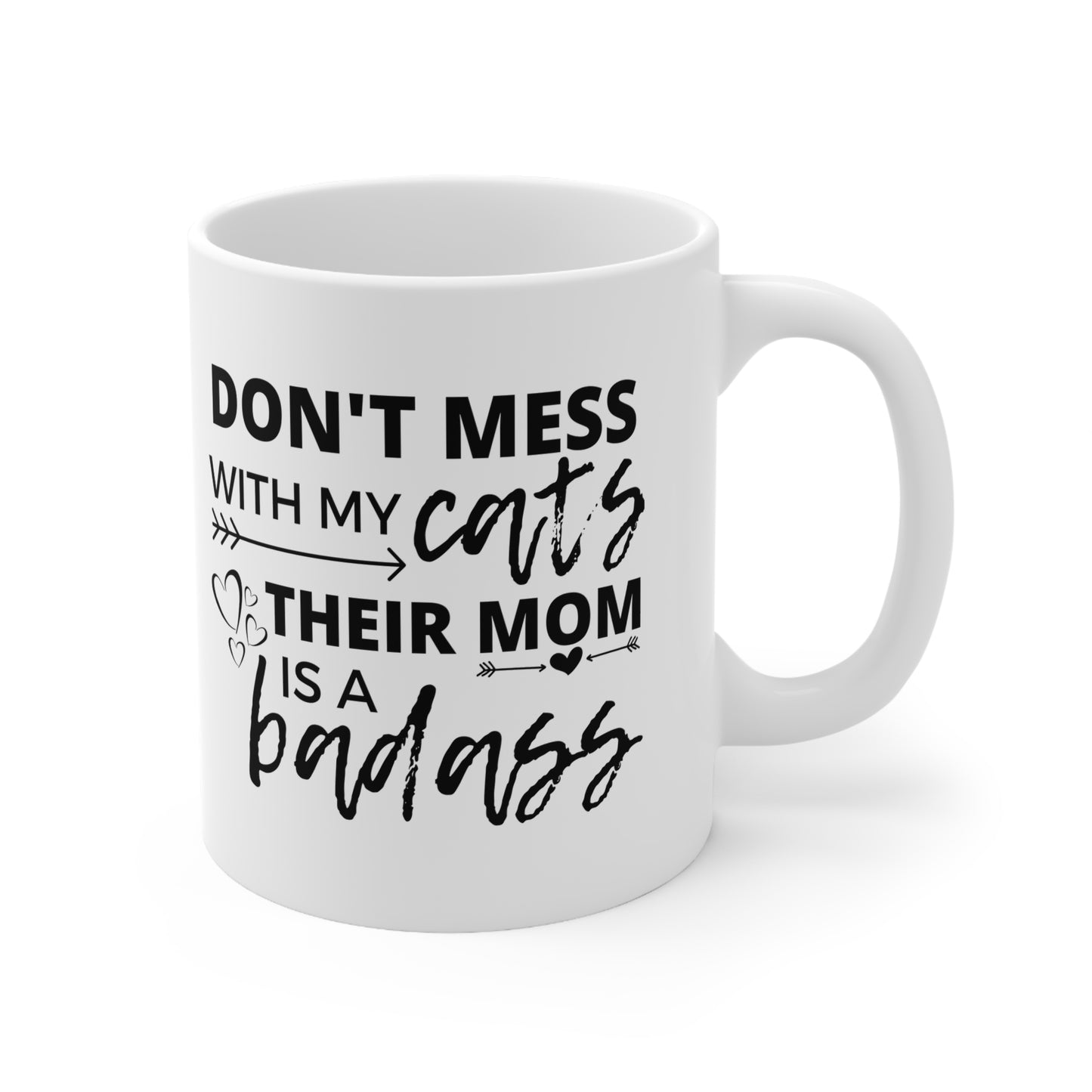 White mug with black text 'Don't mess with my cats their mom is a badass' on a white background