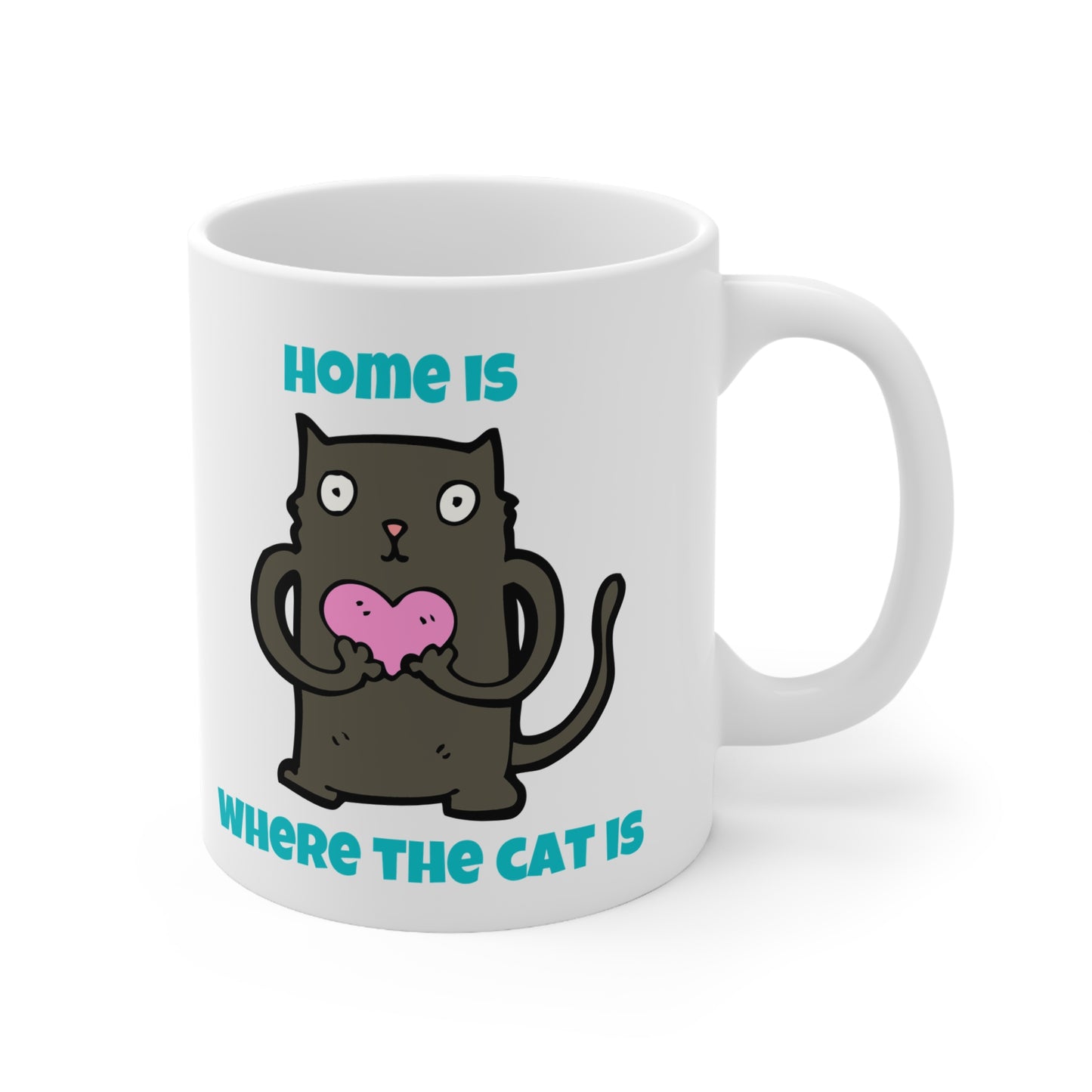 White mug with a black cat holding a pink heart and text 'Home is where the cat is' on a white background