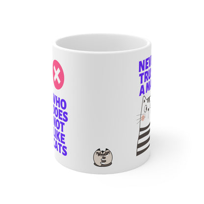 Never Trust A Man Who Does Not Like Cats Mug