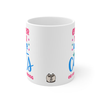 White mug with colorful text and a small graphic on a white background