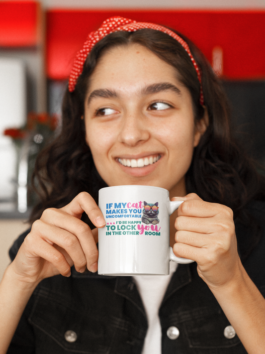 Woman holding a mug with a humorous text design in a kitchen setting